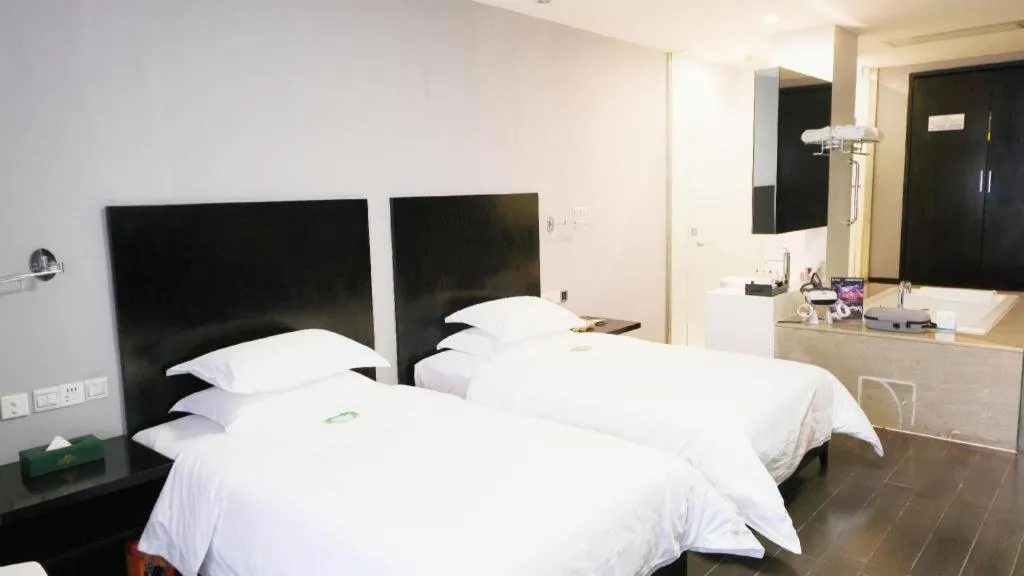 Bed in Guangdong Nanmei Osotto Hotel