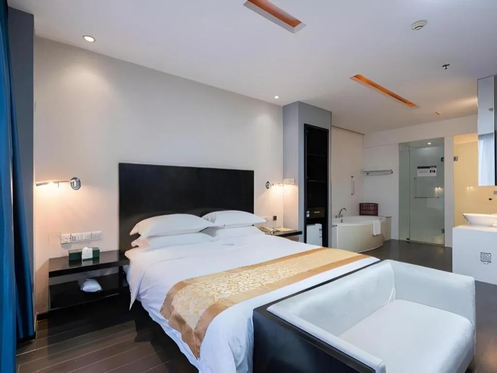 Bed in Guangdong Nanmei Osotto Hotel