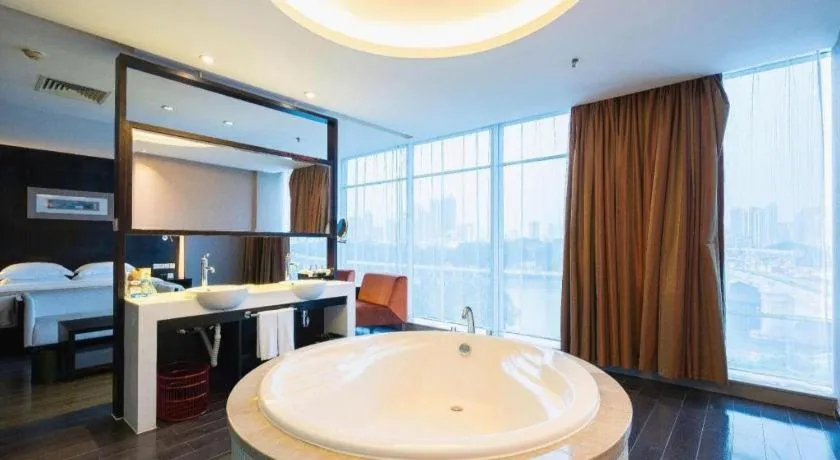 Bed in Guangdong Nanmei Osotto Hotel