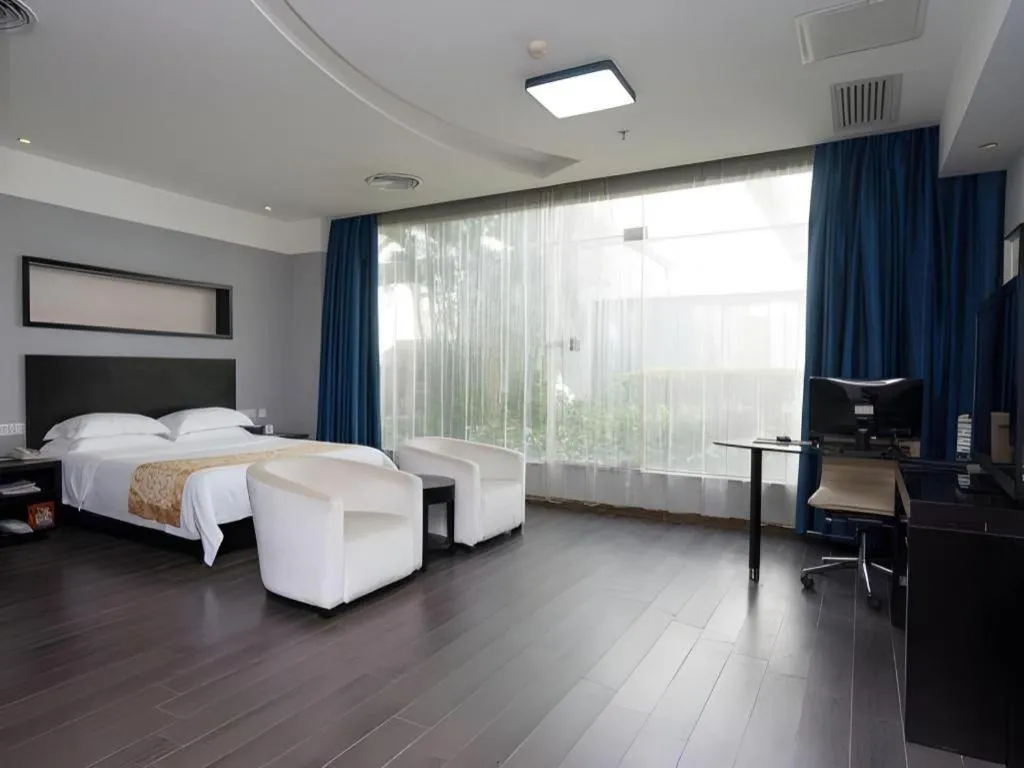 Bed in Guangdong Nanmei Osotto Hotel