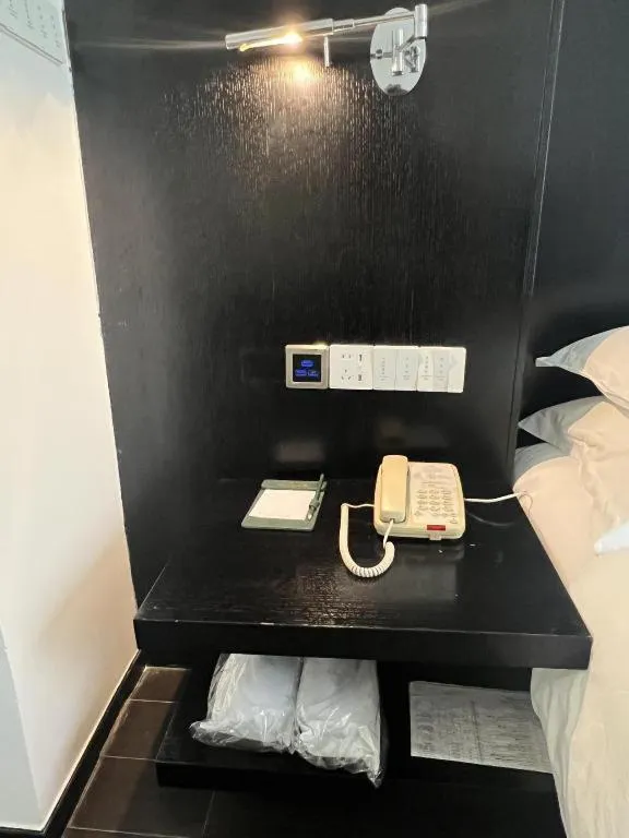 Bed in Guangdong Nanmei Osotto Hotel