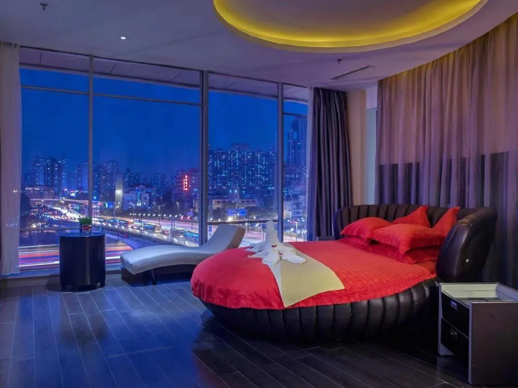 Bed in Guangdong Nanmei Osotto Hotel