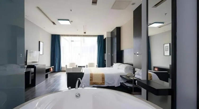 Bed in Guangdong Nanmei Osotto Hotel