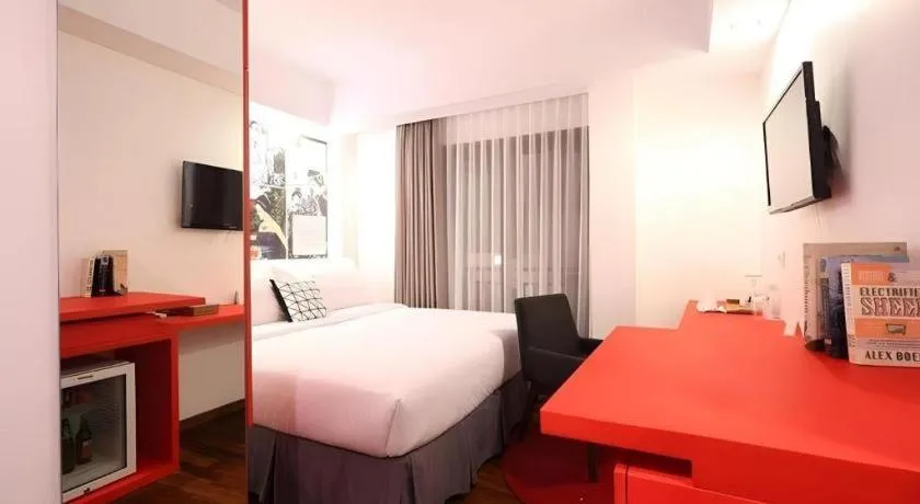 Bed in The Silk Art Design Hotel