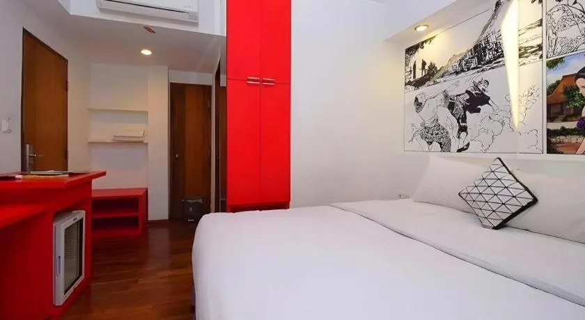 Bed in The Silk Art Design Hotel