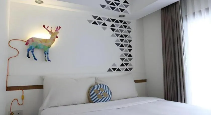 Bed in The Silk Art Design Hotel