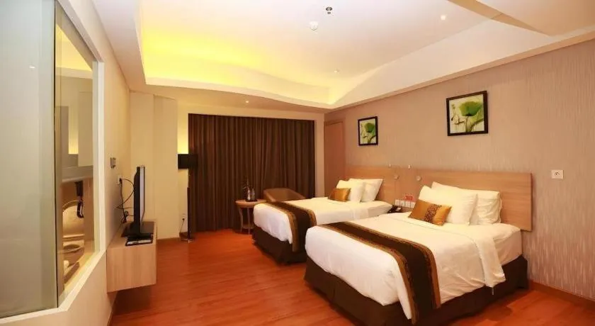 Bed in Golden Tulip Galaxy Hotel Banjarmasin