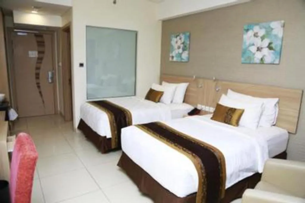 Bed in Golden Tulip Galaxy Hotel Banjarmasin