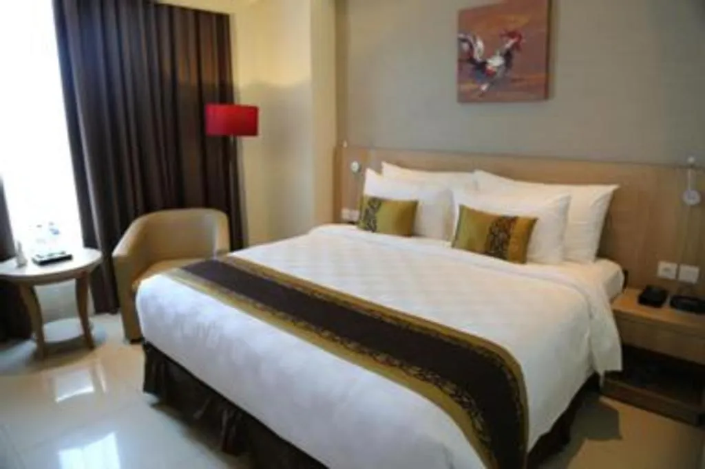 Bed in Golden Tulip Galaxy Hotel Banjarmasin