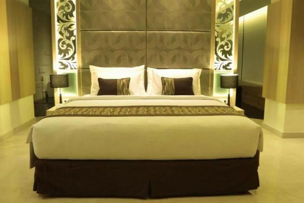 Bed in Golden Tulip Galaxy Hotel Banjarmasin