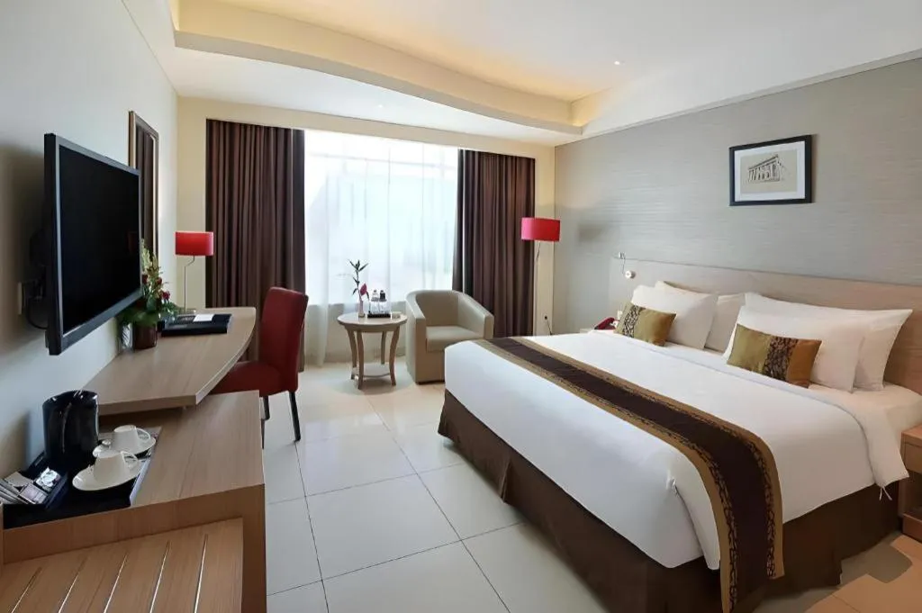 Bed in Golden Tulip Galaxy Hotel Banjarmasin