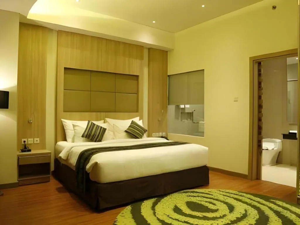 Bed in Golden Tulip Galaxy Hotel Banjarmasin
