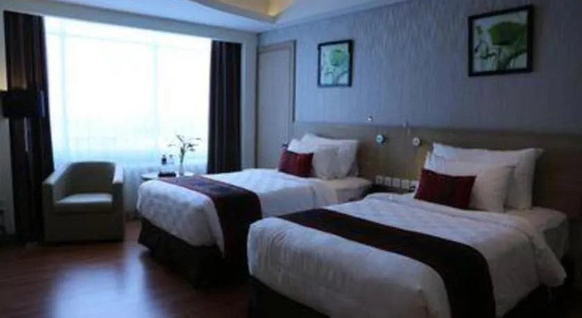 Bed in Golden Tulip Galaxy Hotel Banjarmasin