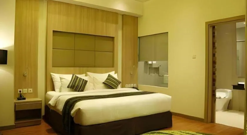 Bed in Golden Tulip Galaxy Hotel Banjarmasin