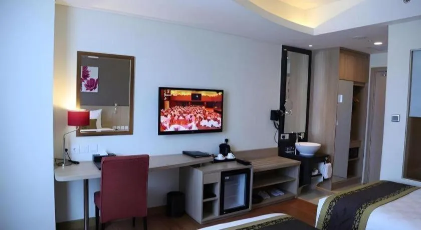 Bed in Golden Tulip Galaxy Hotel Banjarmasin