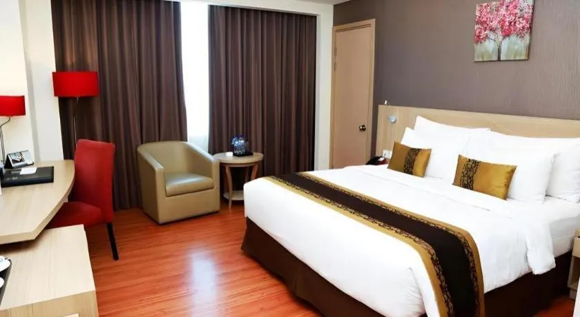 Bed in Golden Tulip Galaxy Hotel Banjarmasin