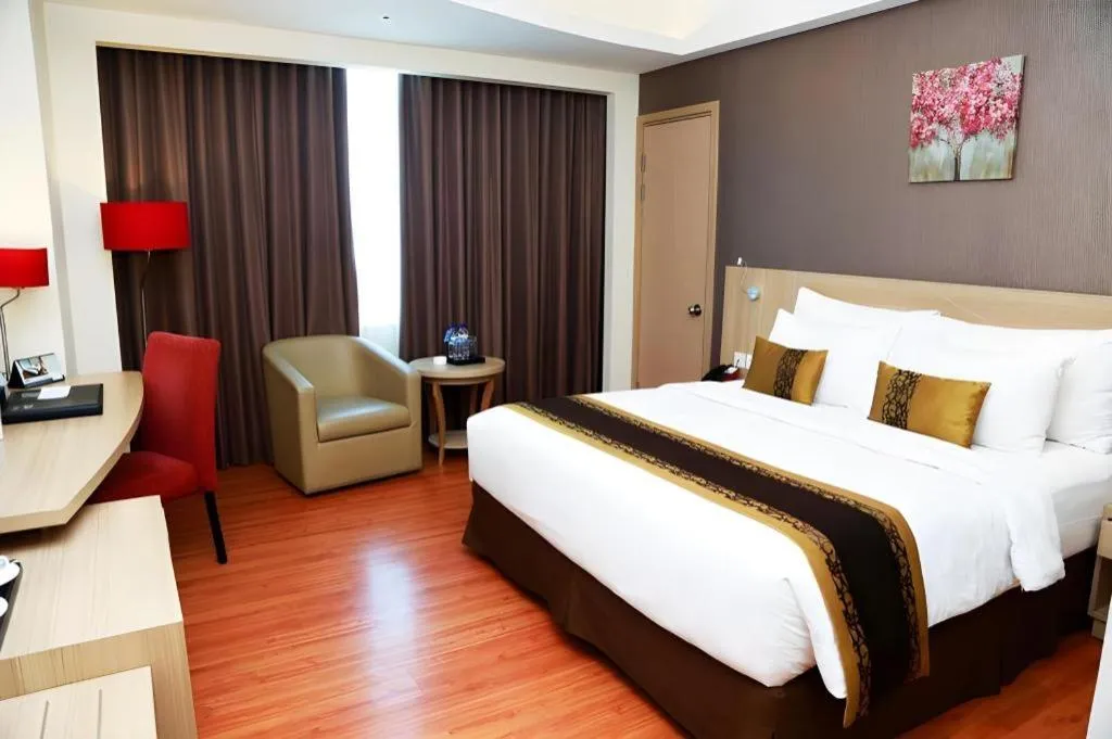 Bed in Golden Tulip Galaxy Hotel Banjarmasin