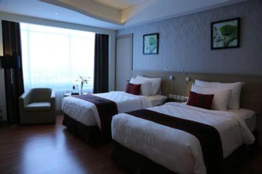 Bed in Golden Tulip Galaxy Hotel Banjarmasin