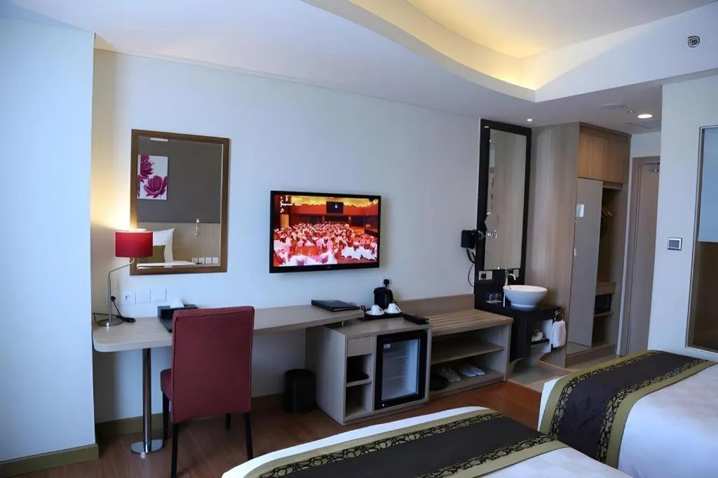 Bed in Golden Tulip Galaxy Hotel Banjarmasin