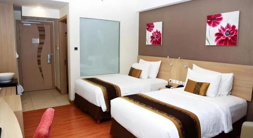 Bed in Golden Tulip Galaxy Hotel Banjarmasin