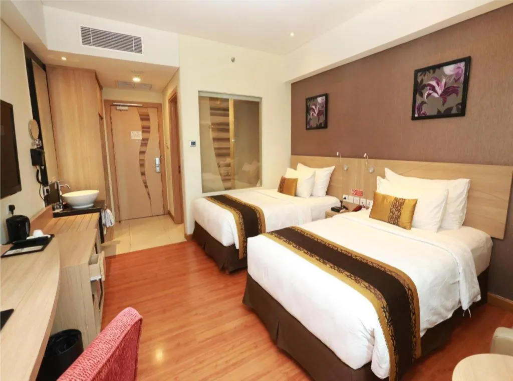 Bed in Golden Tulip Galaxy Hotel Banjarmasin