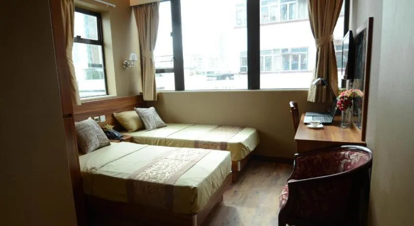 Bed in VP Apartments