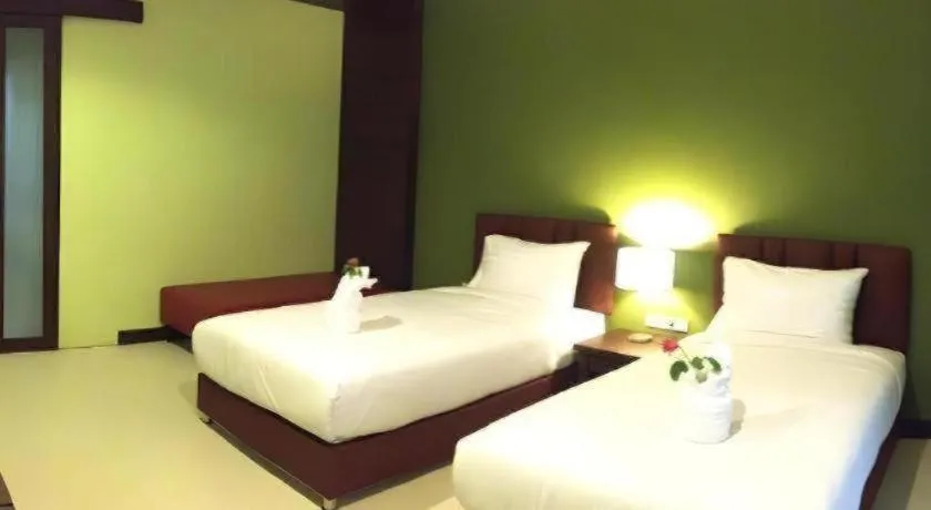 Bed in Villa Thiwa Hotel