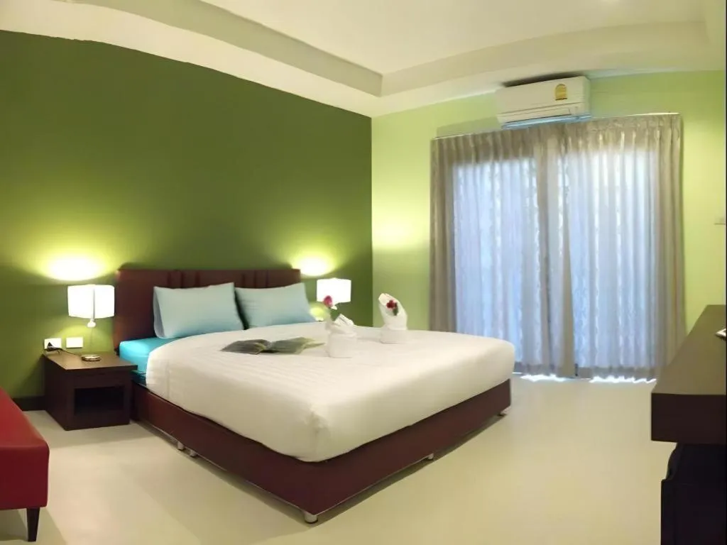 Bed in Villa Thiwa Hotel