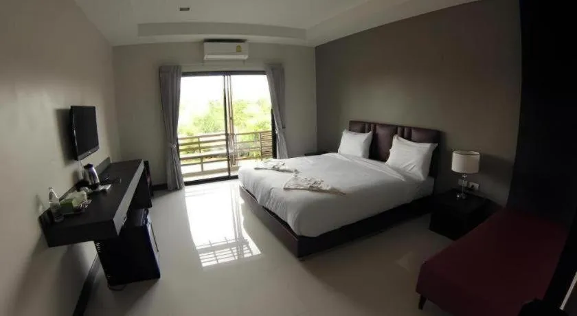 Bed in Villa Thiwa Hotel