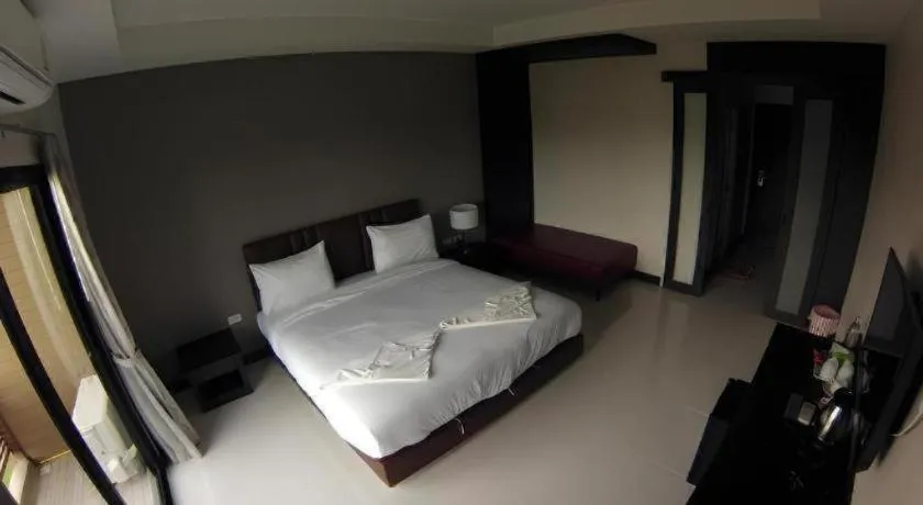 Bed in Villa Thiwa Hotel