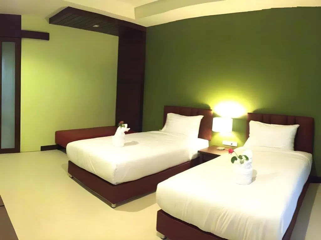 Bed in Villa Thiwa Hotel