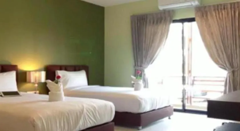 Bed in Villa Thiwa Hotel