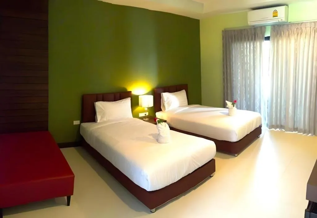 Bed in Villa Thiwa Hotel