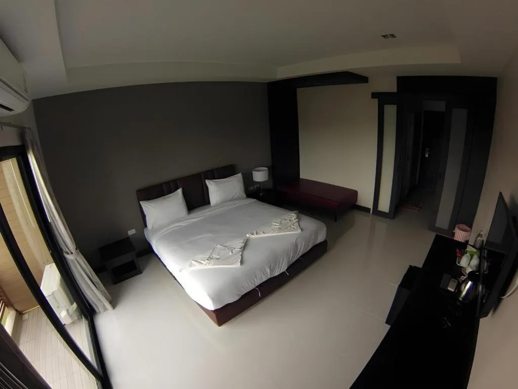 Bed in Villa Thiwa Hotel