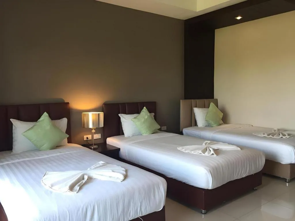 Bed in Villa Thiwa Hotel
