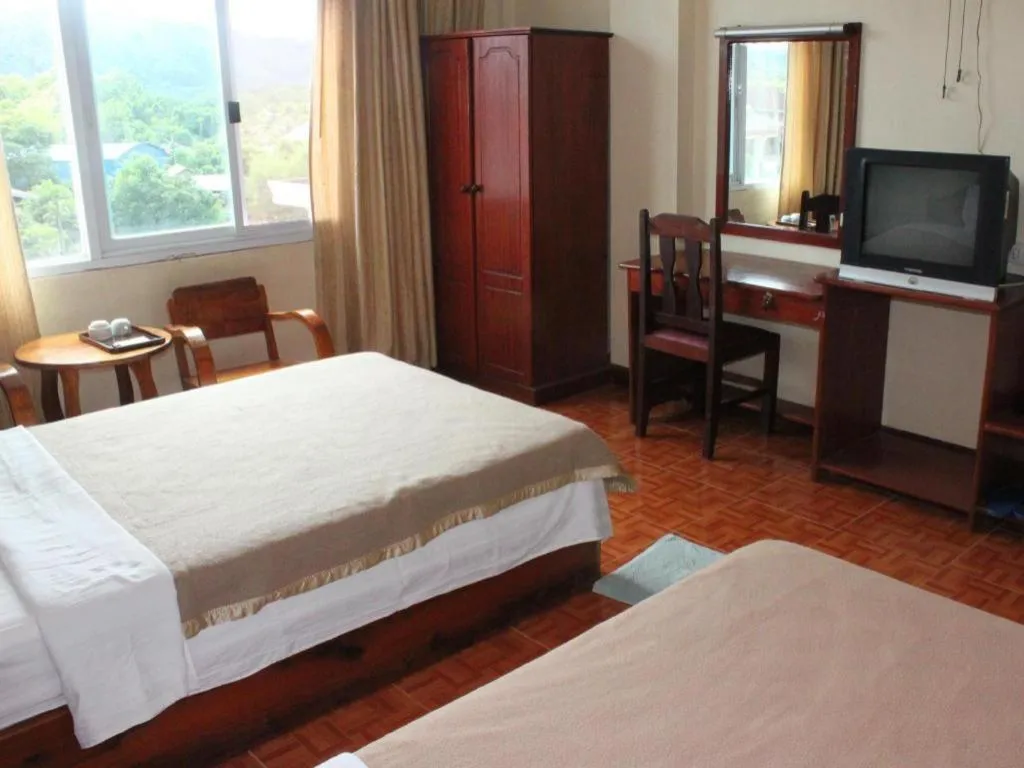 Bed in Dokchampa Hotel