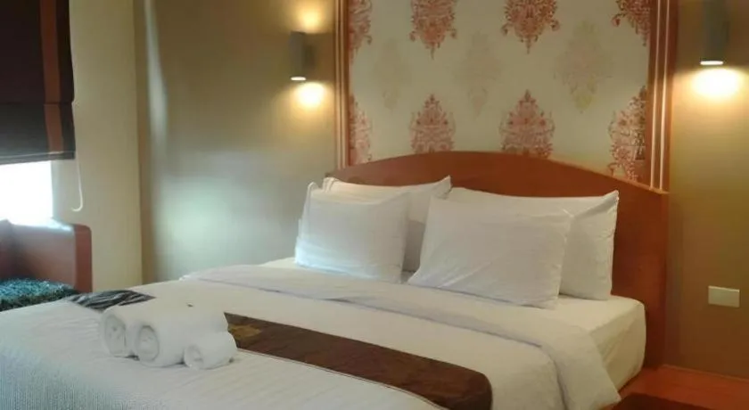 Bed in Thada Chateau Hotel