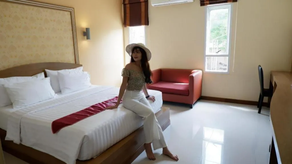 Bed in Thada Chateau Hotel