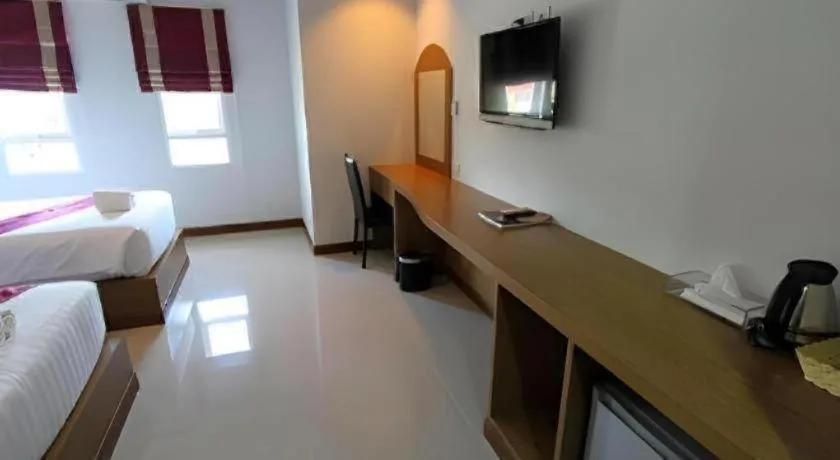 Bed in Thada Chateau Hotel