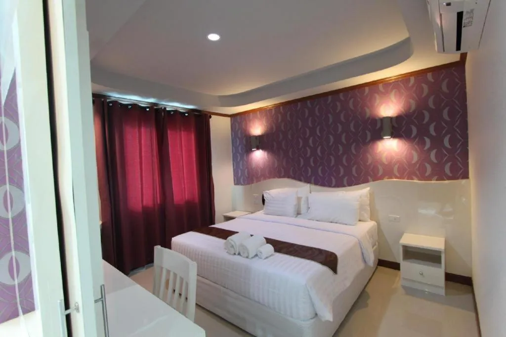 Bed in Thada Chateau Hotel