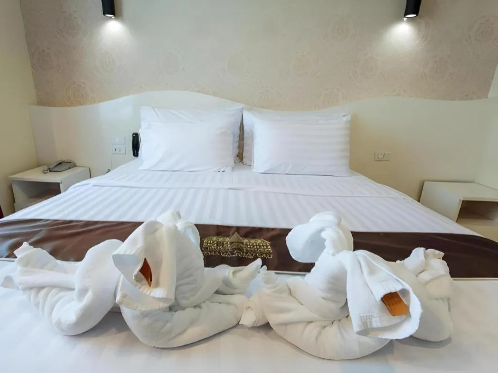 Bed in Thada Chateau Hotel