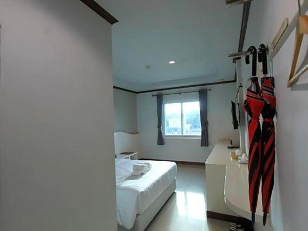 Bed in Thada Chateau Hotel