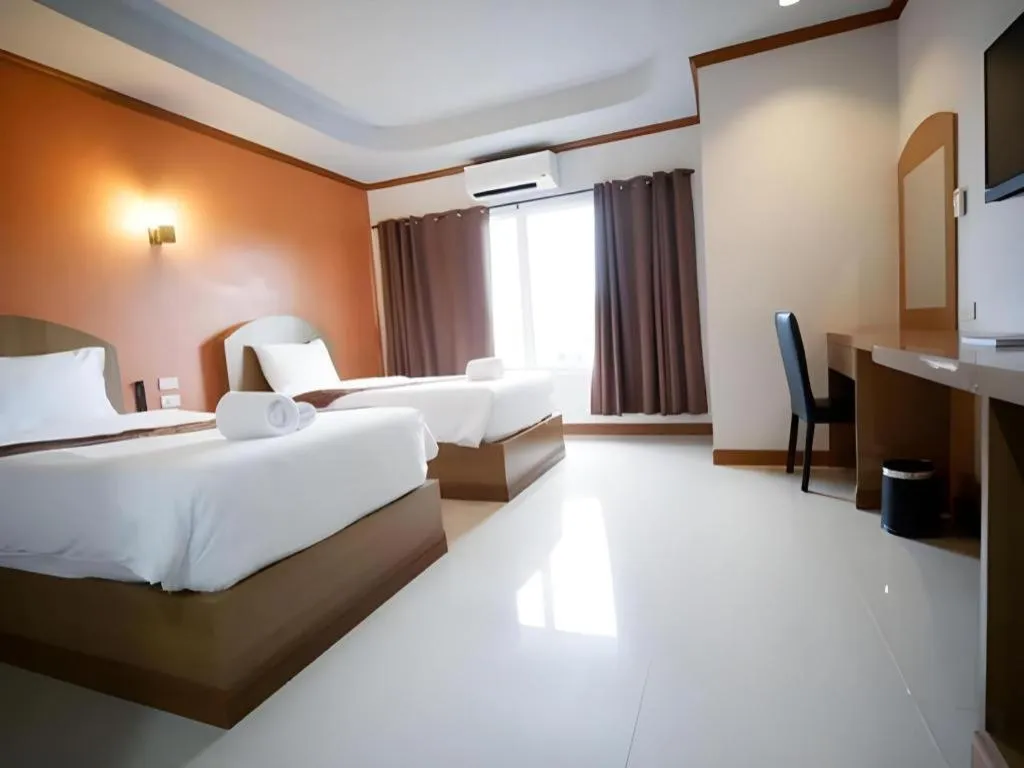 Bed in Thada Chateau Hotel