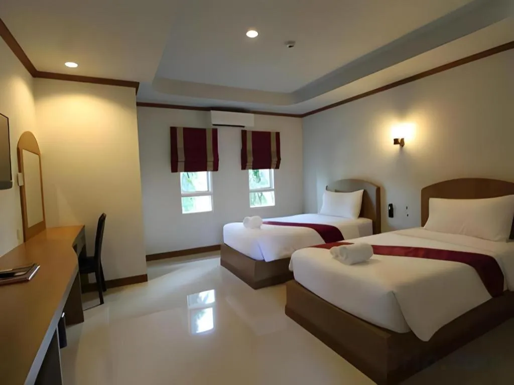 Bed in Thada Chateau Hotel