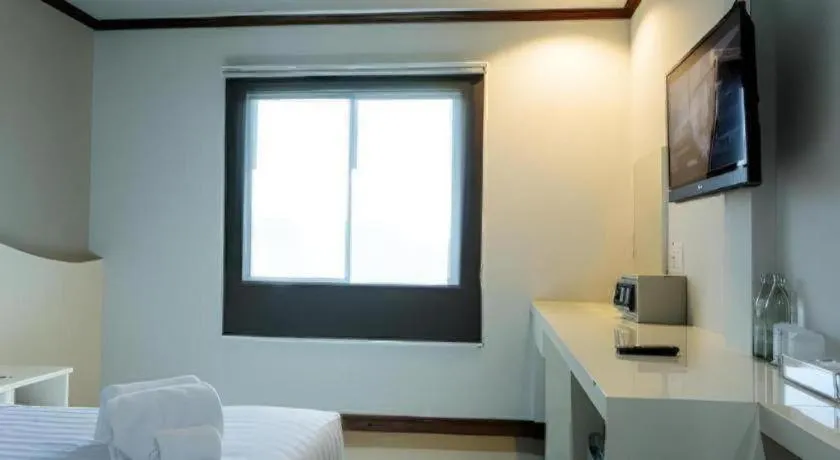 Bed in Thada Chateau Hotel