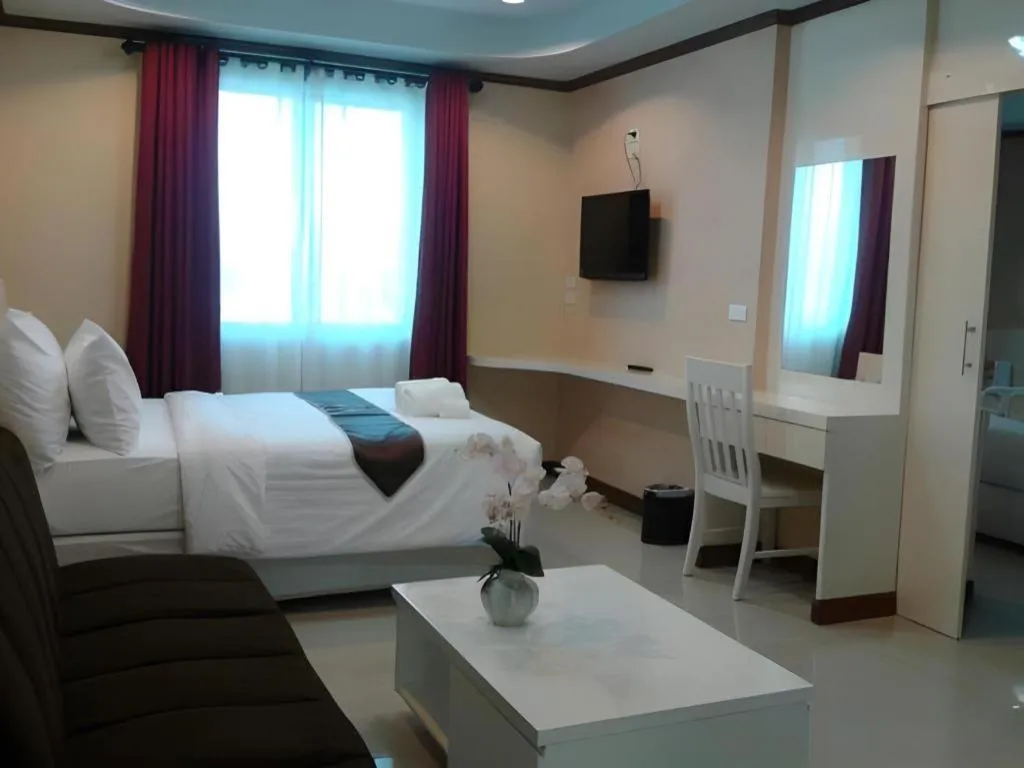 Bed in Thada Chateau Hotel