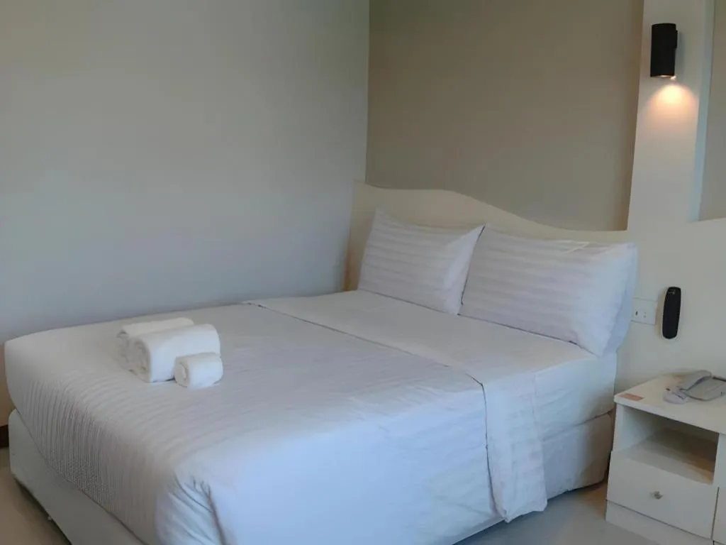 Bed in Thada Chateau Hotel