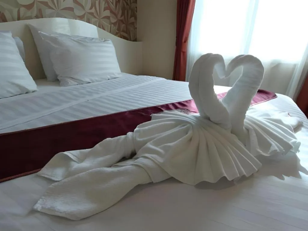 Bed in Thada Chateau Hotel