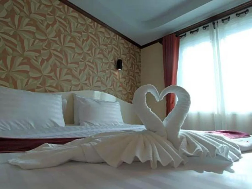 Bed in Thada Chateau Hotel