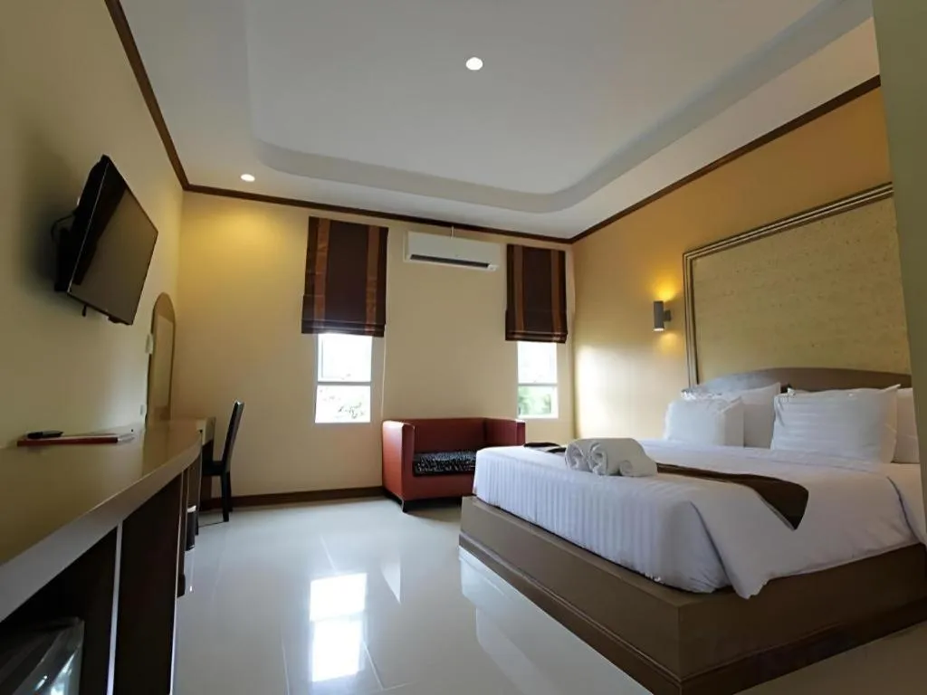 Bed in Thada Chateau Hotel